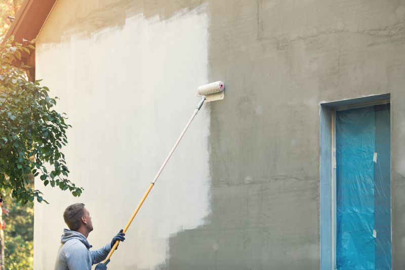 Applying Exterior Paint on Walls